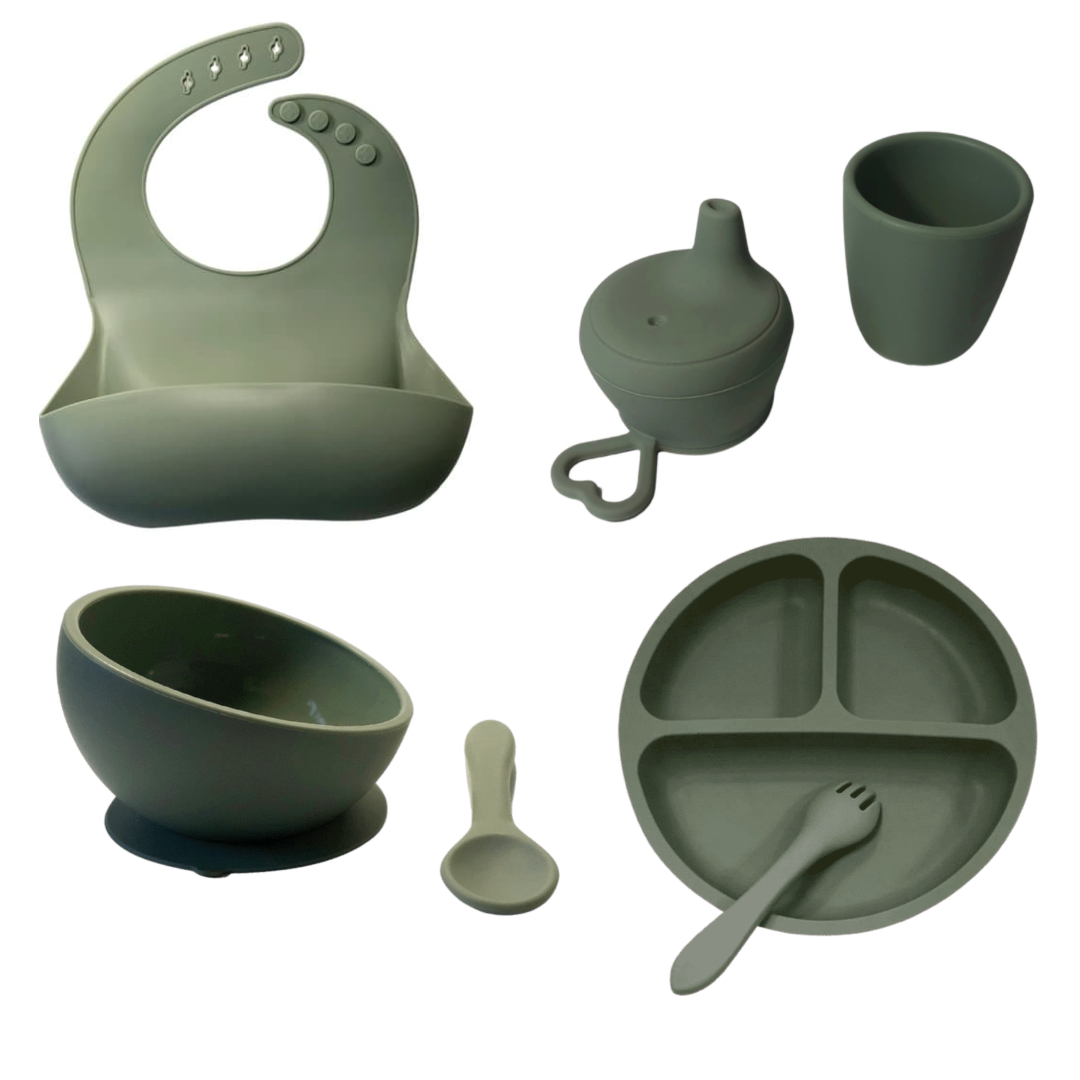full dinnerware set for toddlers and babies in silicone. Sage baby set for meals including suction bowl, divided plate, bib, spill proof sippy cup and baby utensils